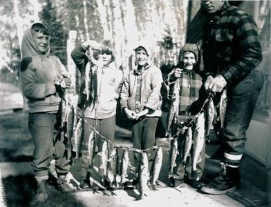 Laufer family with fish caught at the Cottage on Big Sand lake in Phelps Wisconsin